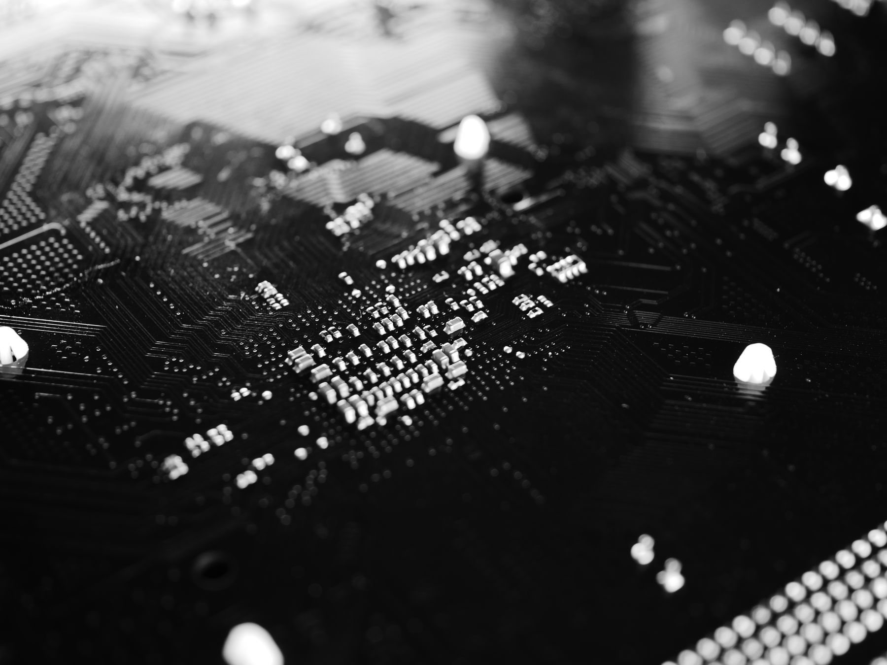 Monochrome detail of a circuit board and its connections